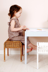 Olli Ella Storie Stool White Sitting Image Lifestyle Available At Loft